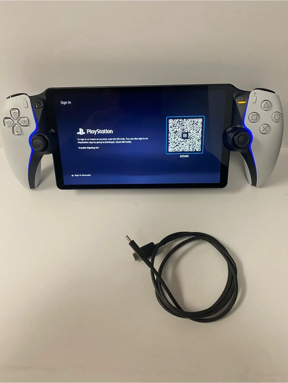Sony PlayStation Portable-style Handheld with White Side Controllers